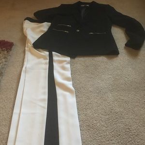 White pants with blue jacket